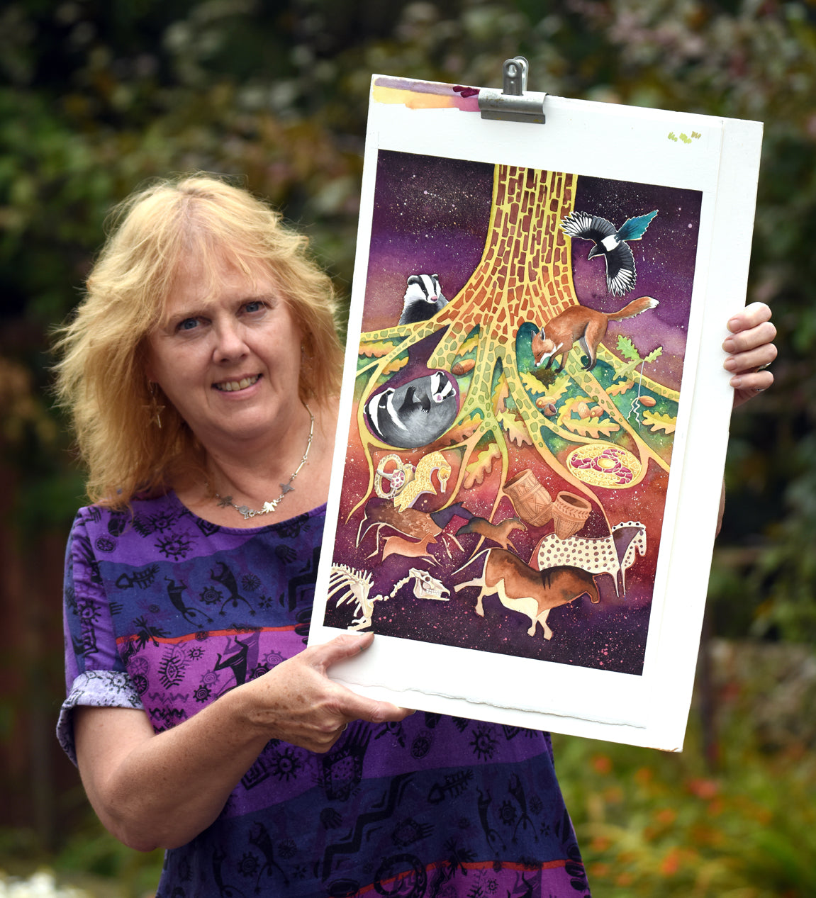 The artist Jane Tomlinson with her painting Dig on Down