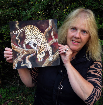 Painting of an ocelot with the artist Jane Tomlinson