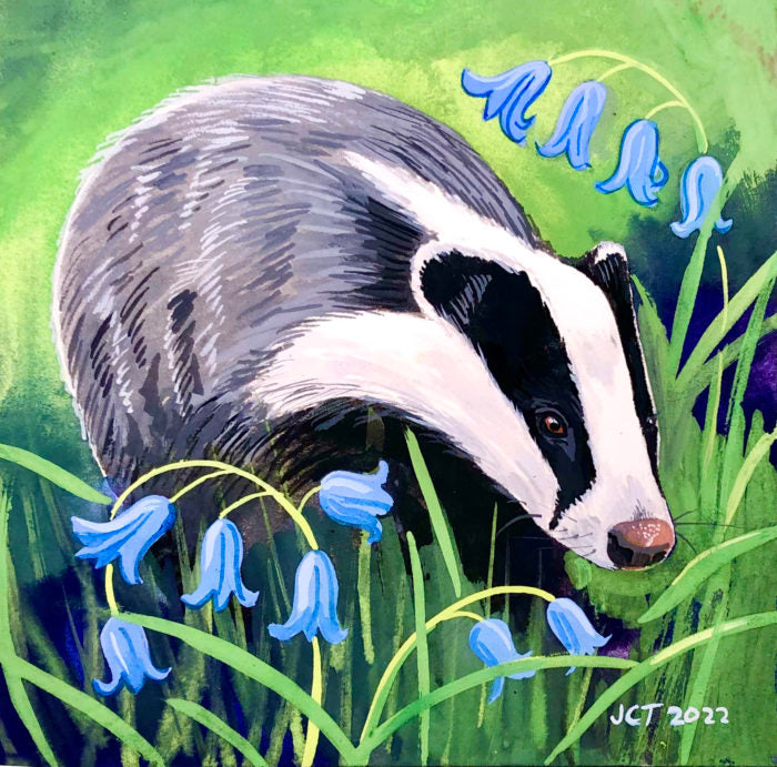 A tiny painting of a badger in the buttercups
