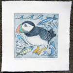 Fish supper - painting of a puffin